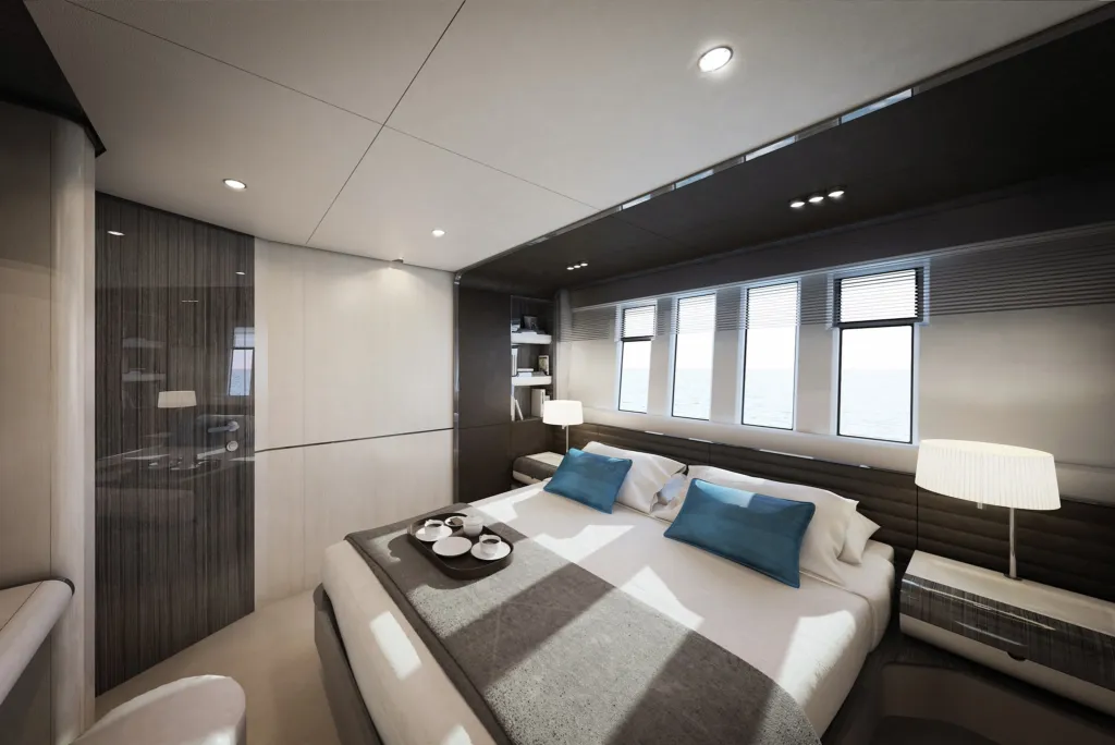 Cabina dell'Azimut Grande 35M con letto matrimoniale, comodini e finestrature