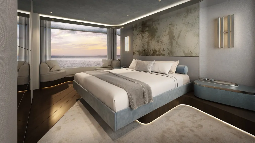 Cabina armatoriale del Magellano 30M con letto matrimoniale e finestratura sul mare