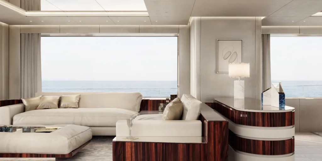 Dettaglio del salone del Benetti B.Now con divano angolare e finestrature sul mare
