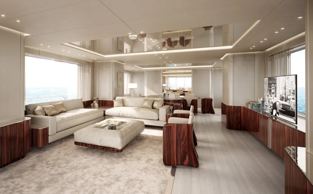 Salone del Benetti B.Now con divani bianchi, TV e mobile in legno scuro