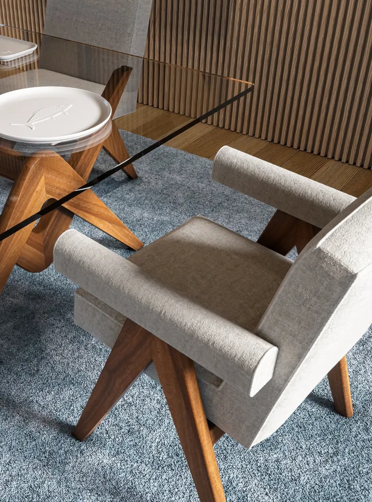 Dettaglio di una sedia da pranzo Cassina in legno con seduta imbottita chiara