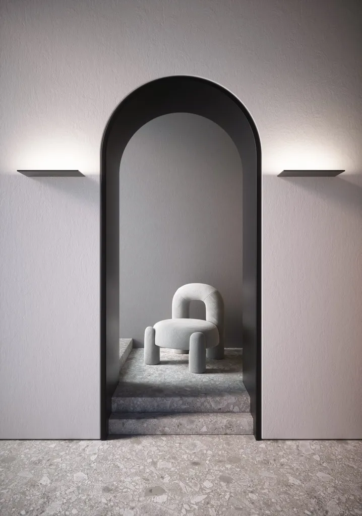 Applique Sottile di Cini&Nils ai lati di un passaggio ad arco con poltrona scultorea