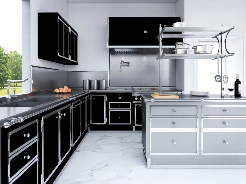 Cucina in acciaio Officine Gullo con mobili neri, isola grigia e pavimento in marmo bianco