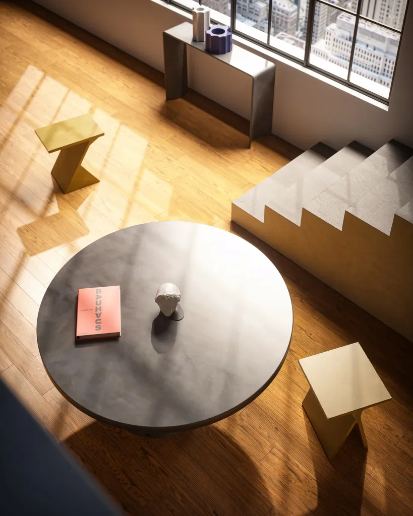 Vista dall'alto di un tavolino rotondo in cemento Forma&Cemento su parquet