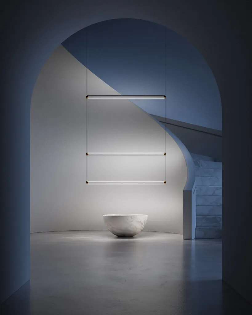 Lampada Magia di Davide Groppi su una parete curva accanto a una scala ad arco