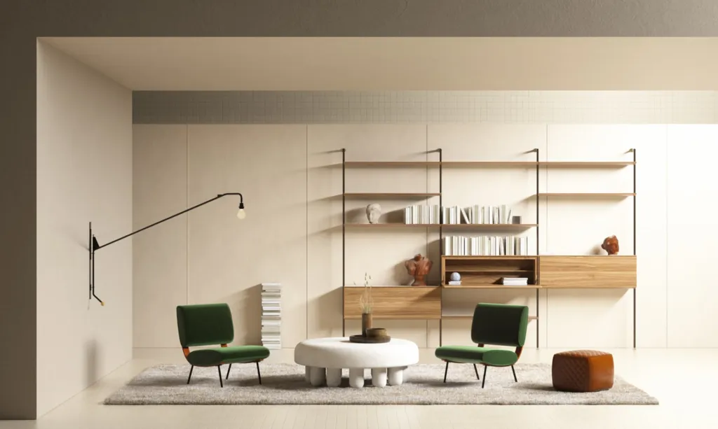 Relax Corner, angolo lettura con poltrona verde, tavolino bianco e libreria a parete in legno