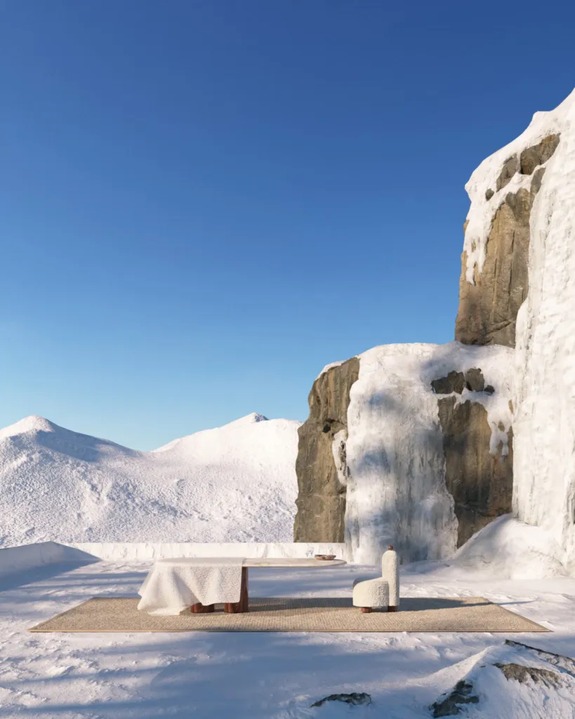 Snow, tavolo bianco tra le rocce innevate sotto un cielo blu